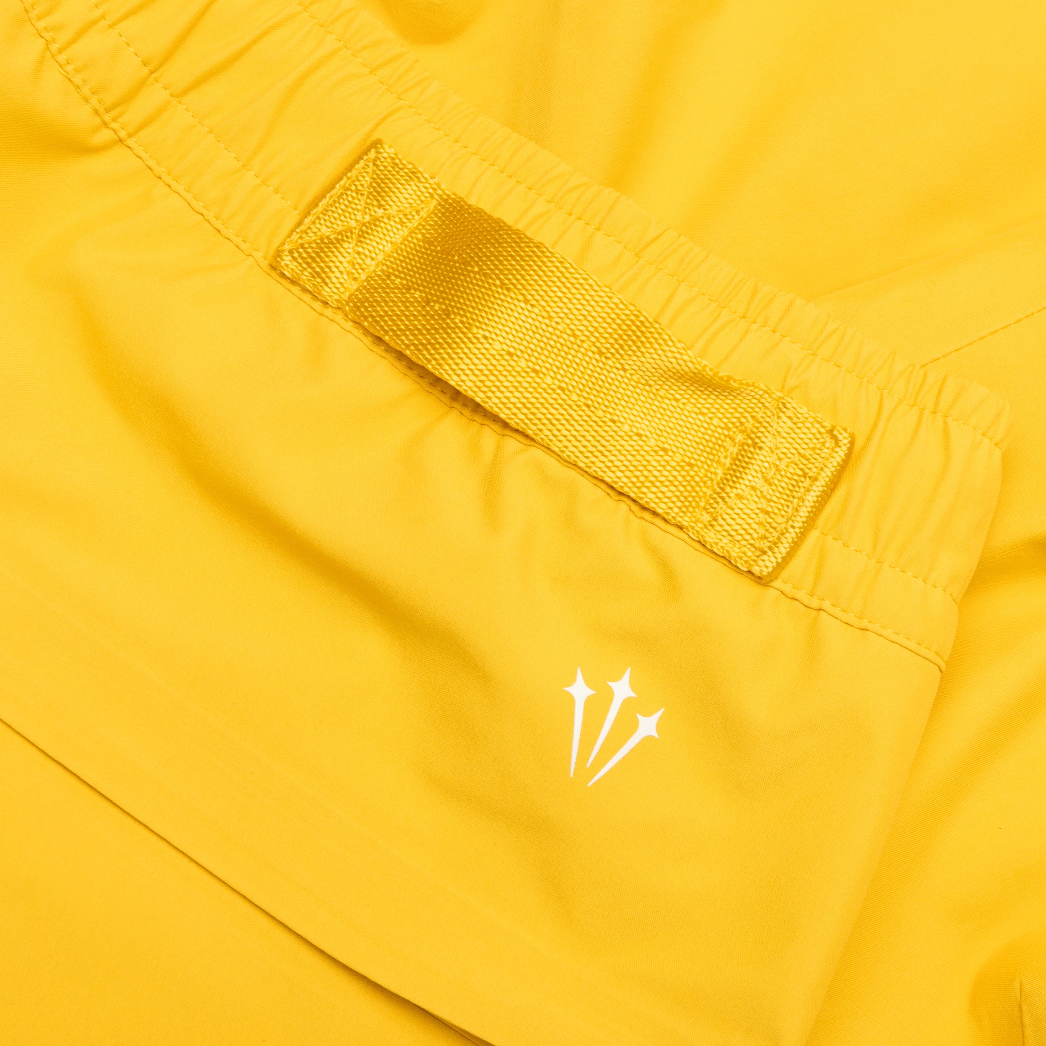 Nocta X LArt Tech Pants Vivid Sulfur Sail