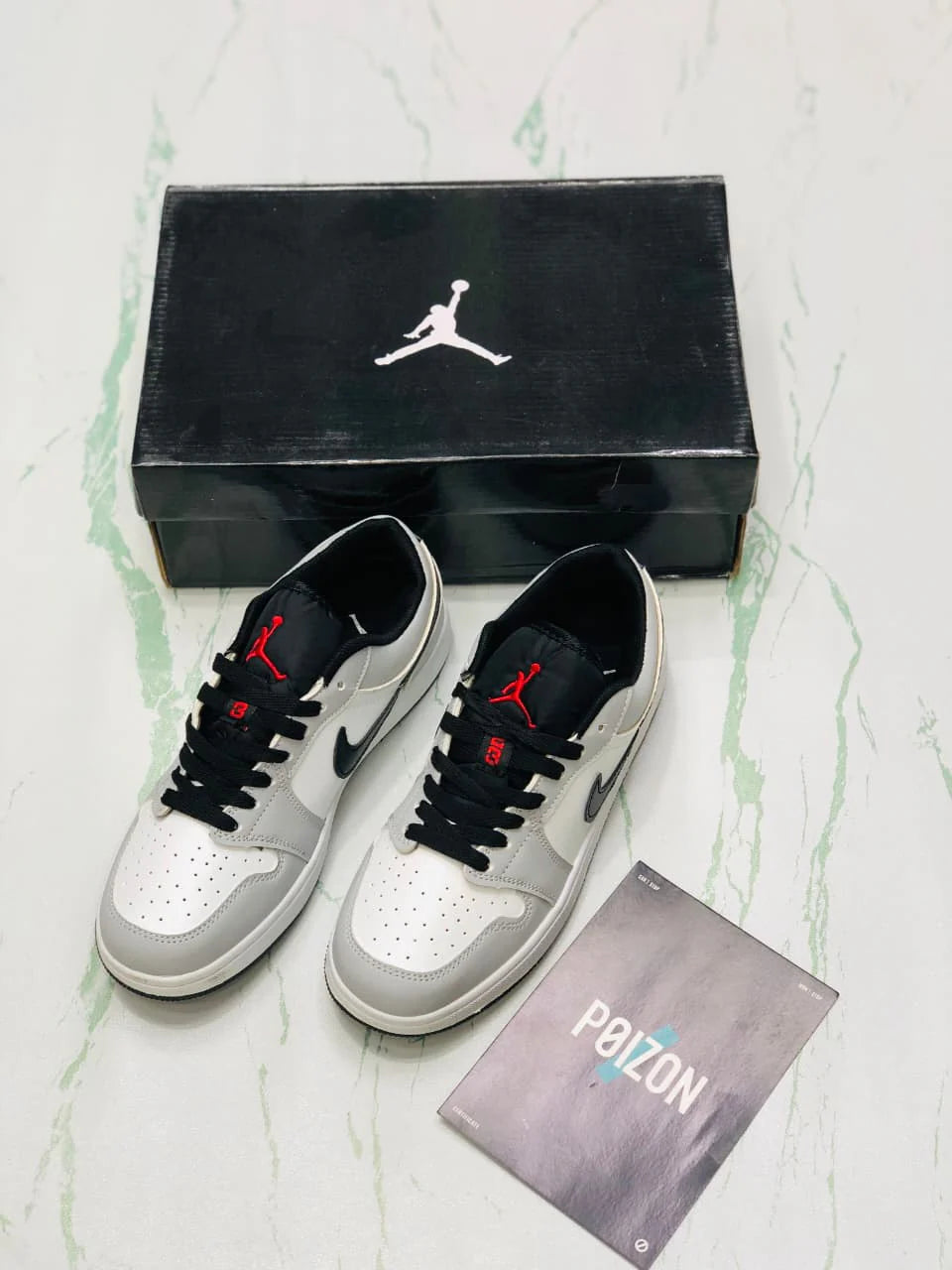 NIKE AIR JORDAN 1 LOW SMOKE GRAY WHITE AND BLACK